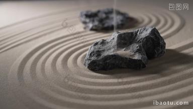 石头在有纹理的沙子上